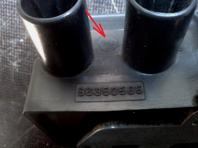 Маркировка номеров цилиндров на корпусе возле выводов катушки зажигания двигателя A15SMS Daewoo Nexia N150