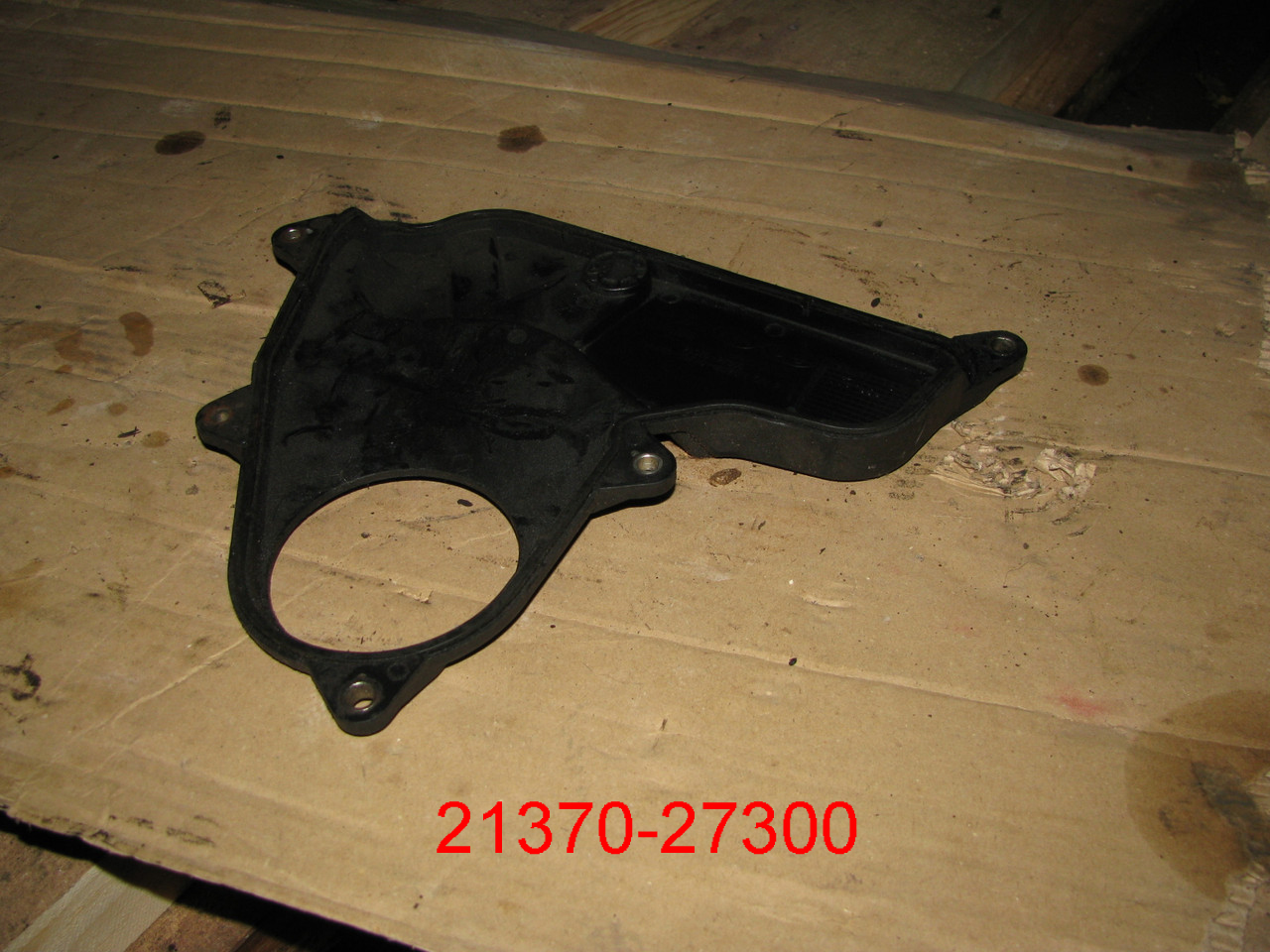 Нижний кожух ГРМ на Hyundai Santa Fe CM 2006-2012