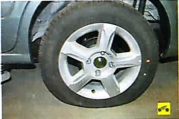 Спущенное колесо Nissan Almera Classic