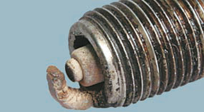 Пепельные отложения на свече Chery Tiggo