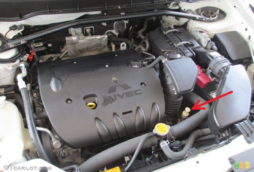 Размещение щупа для проверки уровня жидкости в вариаторе Mitsubishi Outlander XL