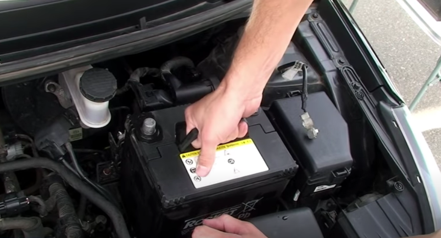 Removal and installation of the battery mounting shelf Kia Rio II 2005 - 2011