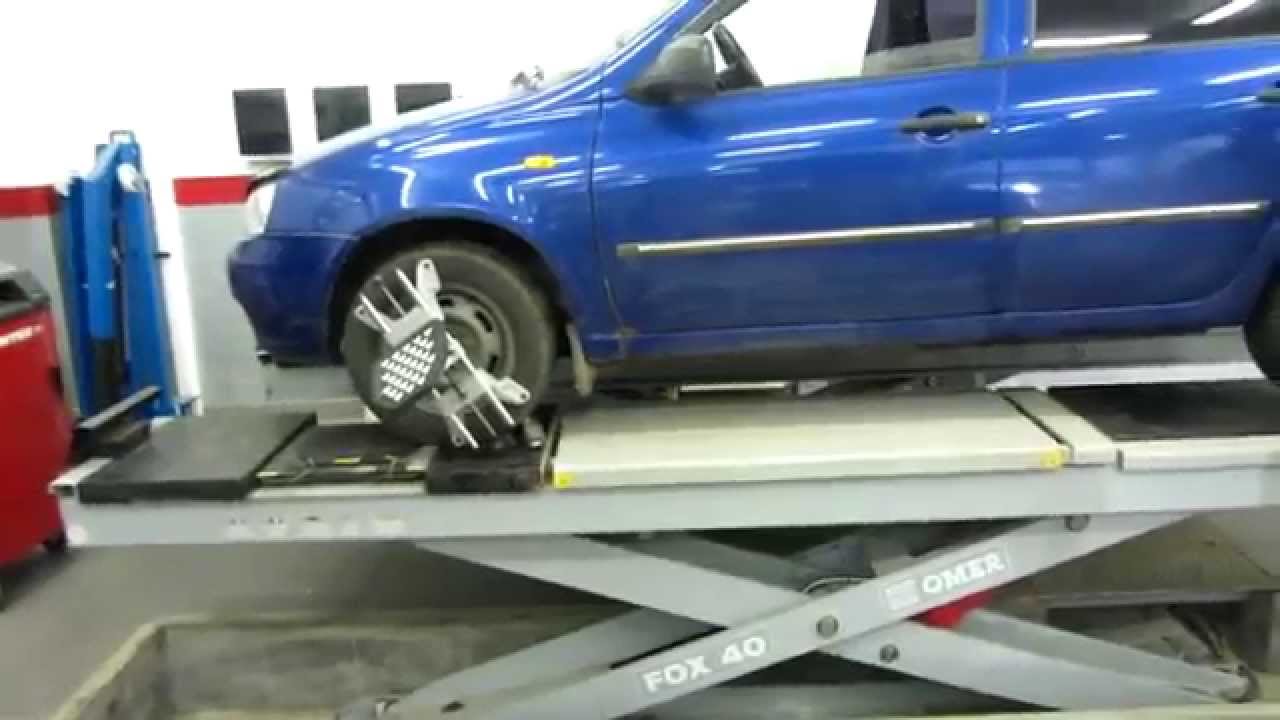 Регулировка угла схождения колес на СТО Lada Kalina